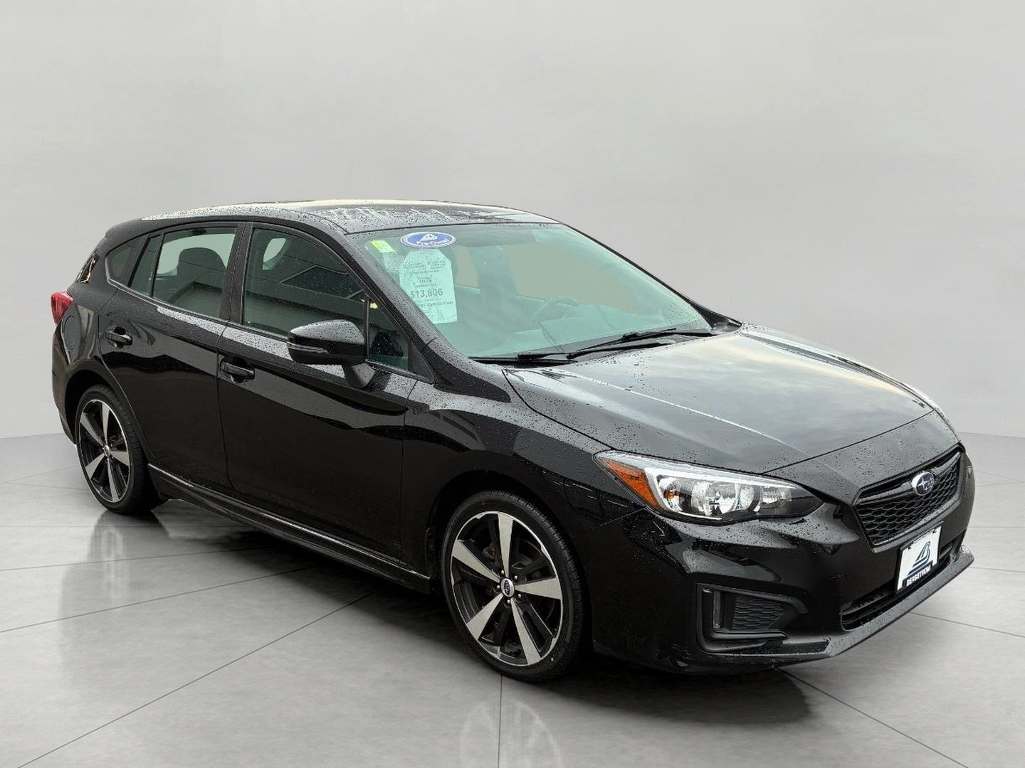 2017 Subaru Impreza 2.0i Sport 5-door CVT in Crystal Black Silica — front three-quarter view